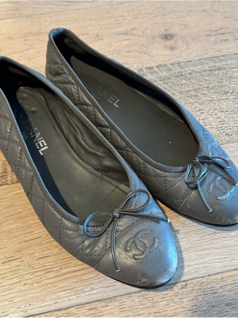 CHANEL Quilted Leather Ballet Flats in Black